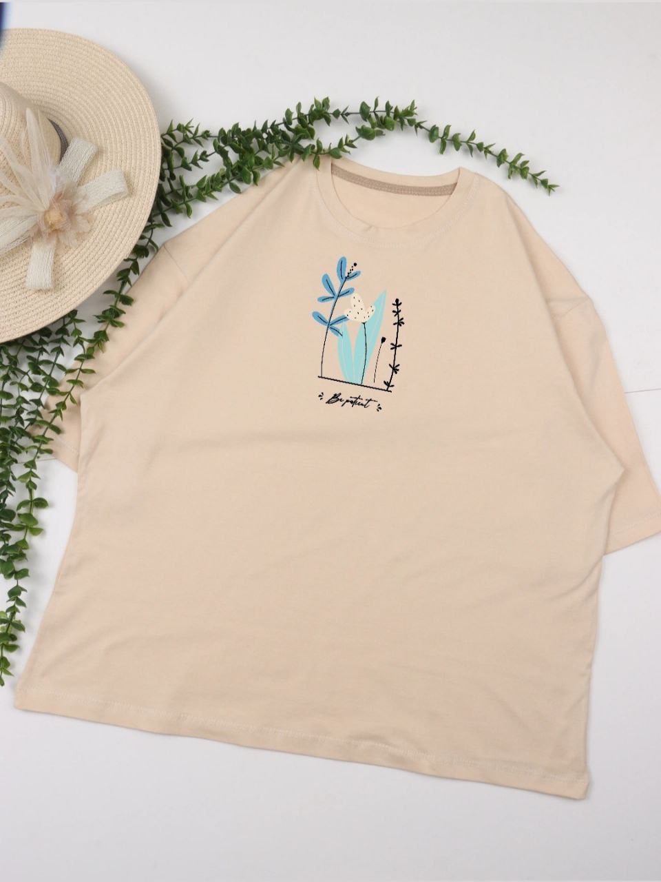 تیشرت زنانه آستین کوتاه باکسی نخی طرح شکوفه