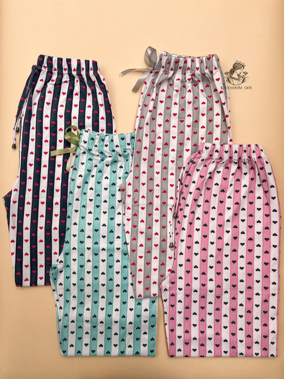 شلوار راسته زنانه طرح راهراه قلبی با جنس نخ پنبه نرم و خنک، مناسب سایز ۴۰ تا ۴۶ و رنگهای پاستلی